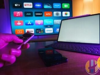 Living-room TV and remote with streaming apps including Disney+ on screen (editorial still)