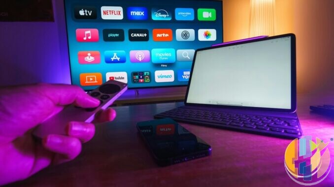 Living-room TV and remote with streaming apps including Disney+ on screen (editorial still)