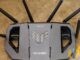 Real ASUS TUF gaming Wi-Fi router on a wooden desk — living-room router hardware that often decides whether a Google TV stick buffers or plays cleanly.
