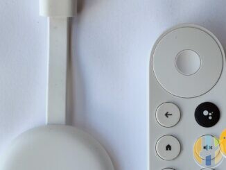 Real Google Chromecast with Google TV handheld product shot — Google TV stick/hub hardware family related to Google TV Streamer use cases; no forged Streamer packaging.