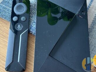 Real NVIDIA SHIELD Android TV console on a desk — Android TV living-room hub hardware in the same class as Freely Android boxes; no Manhattan or Netgem forged marks.