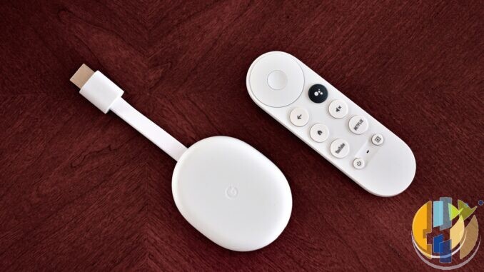 Real Chromecast with Google TV stick and remote on a desk — Freely-plus-apps stack living-room hardware; no forged Sky Stream logos.