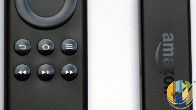 Amazon Fire TV Stick and Alexa Voice Remote close-up on white surface, husham.com stamp, September 2026
