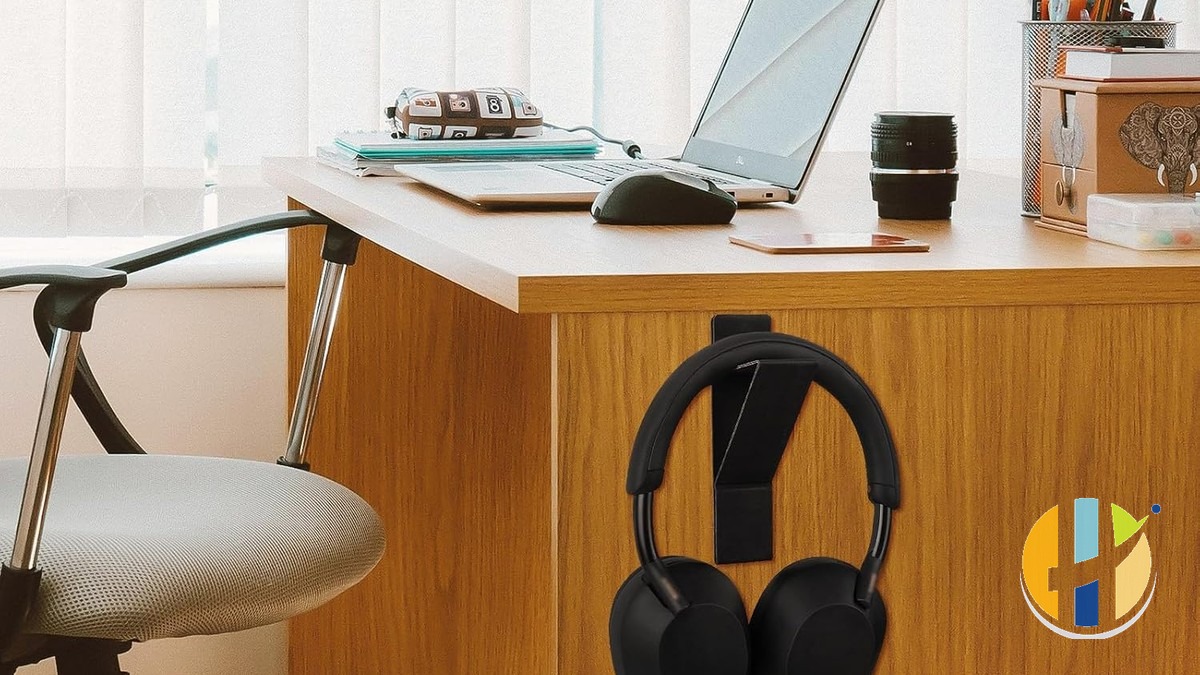 Foldable headphone hook on desk setup, husham.com stamp
