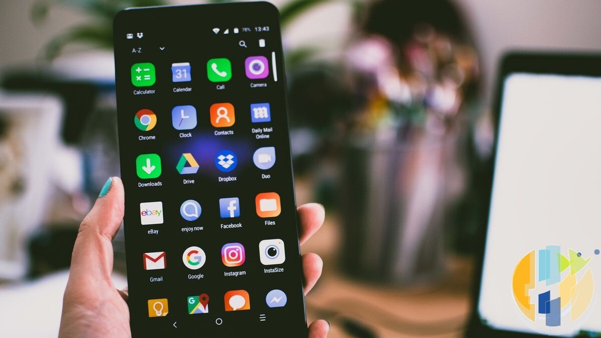 Real smartphone on a dark surface — phone used for hotel/public Wi-Fi streaming and VPN client apps; no forged VPN vendor logos.