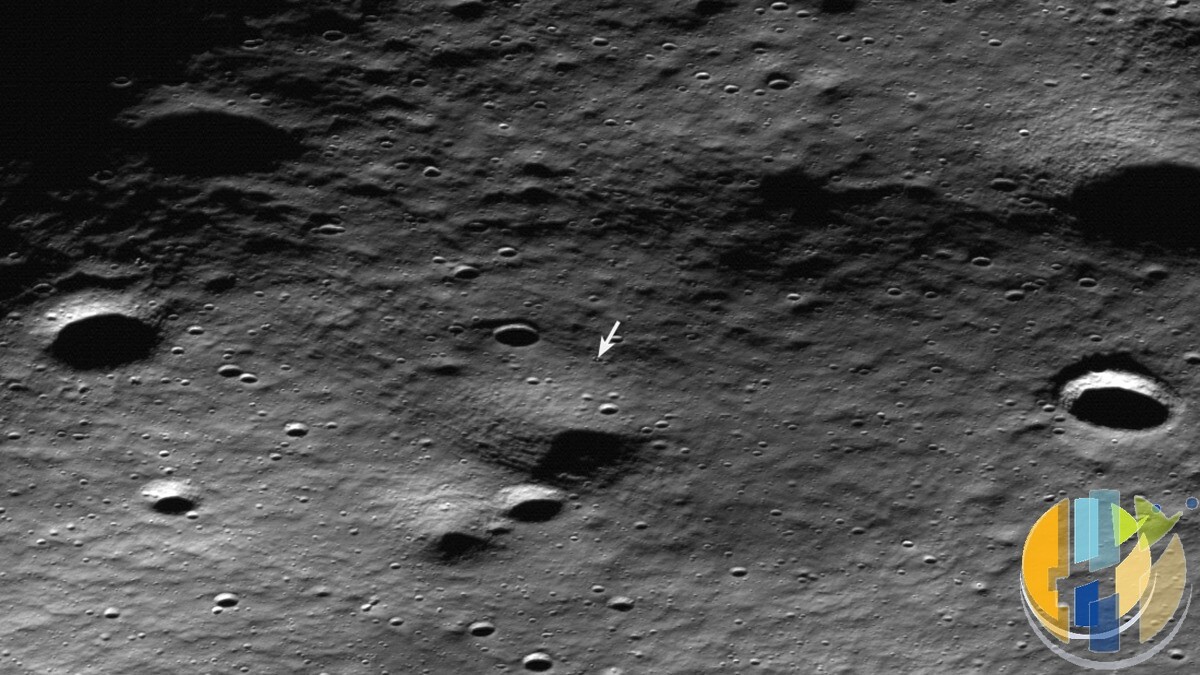NASA Lunar Reconnaissance Orbiter view of the Moon's south pole region with an arrow marking the tipped IM-2 Athena lander in a small crater