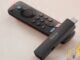 Amazon Fire TV Stick HD 2026 with fire tv lettering and a USB-C port, shown with an Alexa Voice Remote
