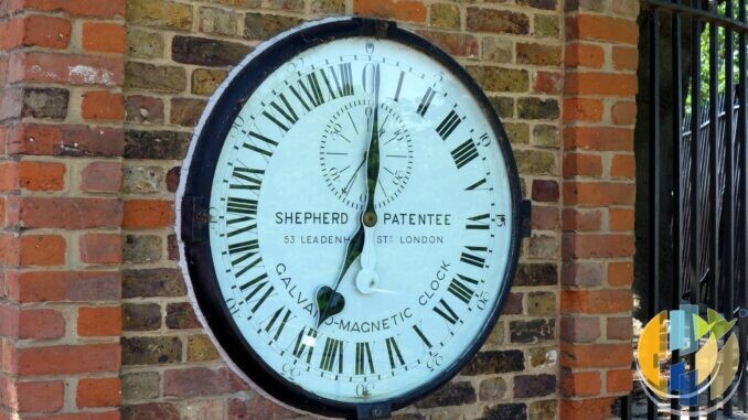 The 24-hour Shepherd Gate Clock on the brick wall at the Royal Observatory Greenwich, the clock that first showed GMT to the public