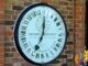 The 24-hour Shepherd Gate Clock on the brick wall at the Royal Observatory Greenwich, the clock that first showed GMT to the public