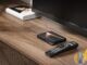 Formuler Z12 Ultra media box and backlit remote on a wooden TV stand