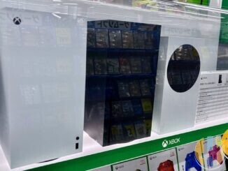 White Xbox Series X and Xbox Series S consoles on display in a games shop