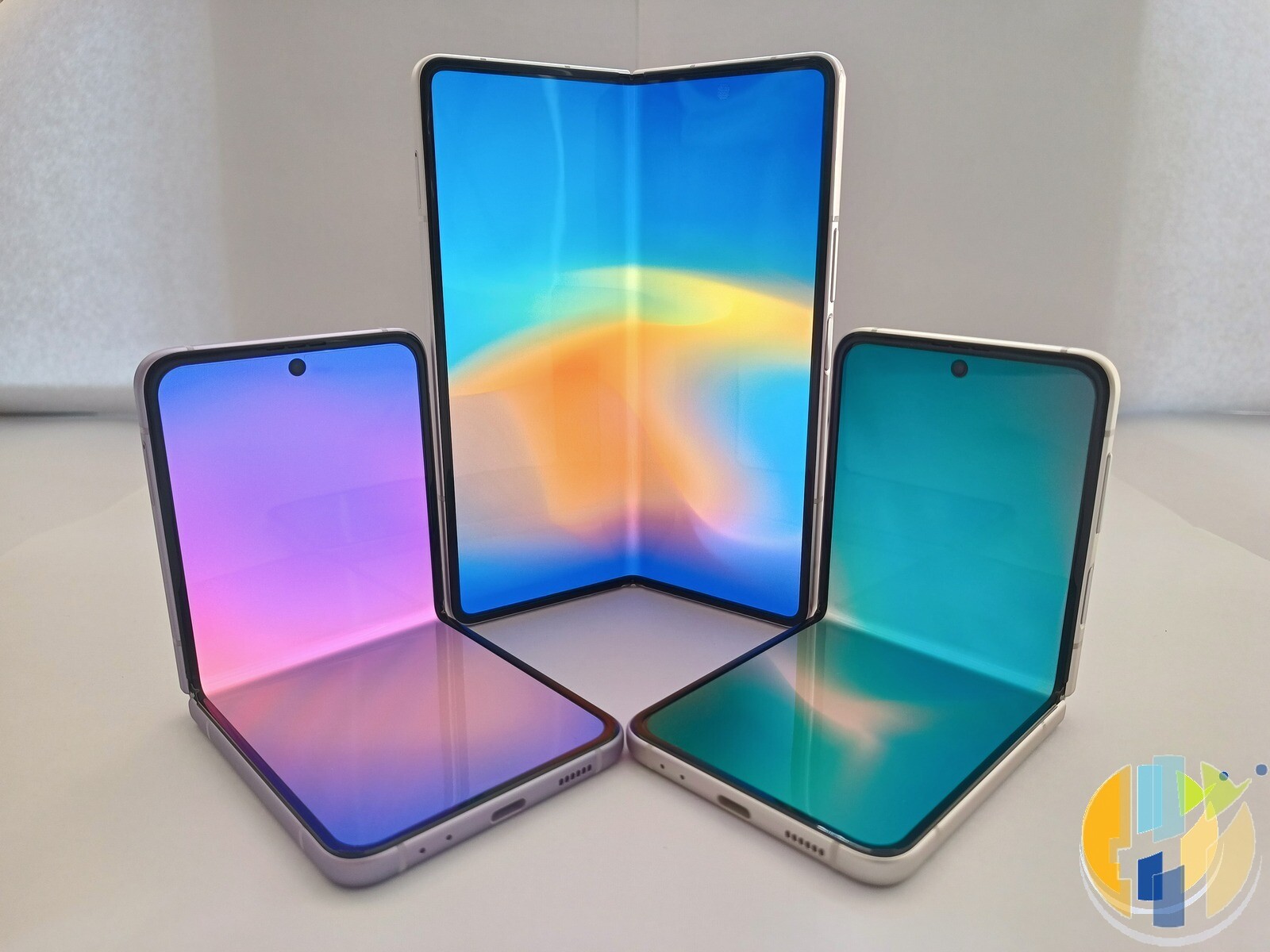 Two foldable Android smartphones open side by side, used as a generic foldable-phone illustration for the iPhone Duo Get Ready guide